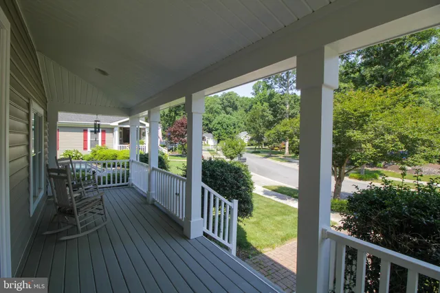 a view of a balcony with chairs