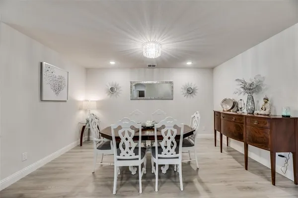 a view of a dining room with furniture