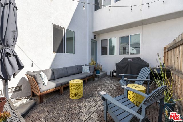 a view of a house with a wooden roof