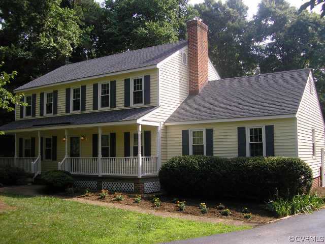 6005 Waters Edge Road Midlothian, VA 23112 - Photo 1 of 1 Exterior Front - Vinyl siding and vinyl windows keep the exterior house maintenance to a minimum. New apron on the driveway leads to rear entry garage.