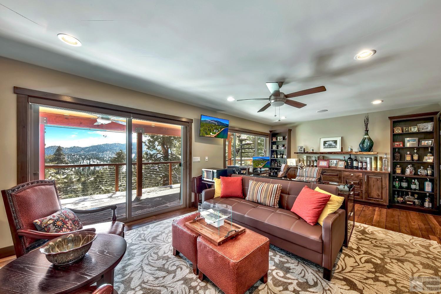 416 Maryanne Drive Stateline, NV 89449 - Photo 13 of 32 a living room with furniture and a large window