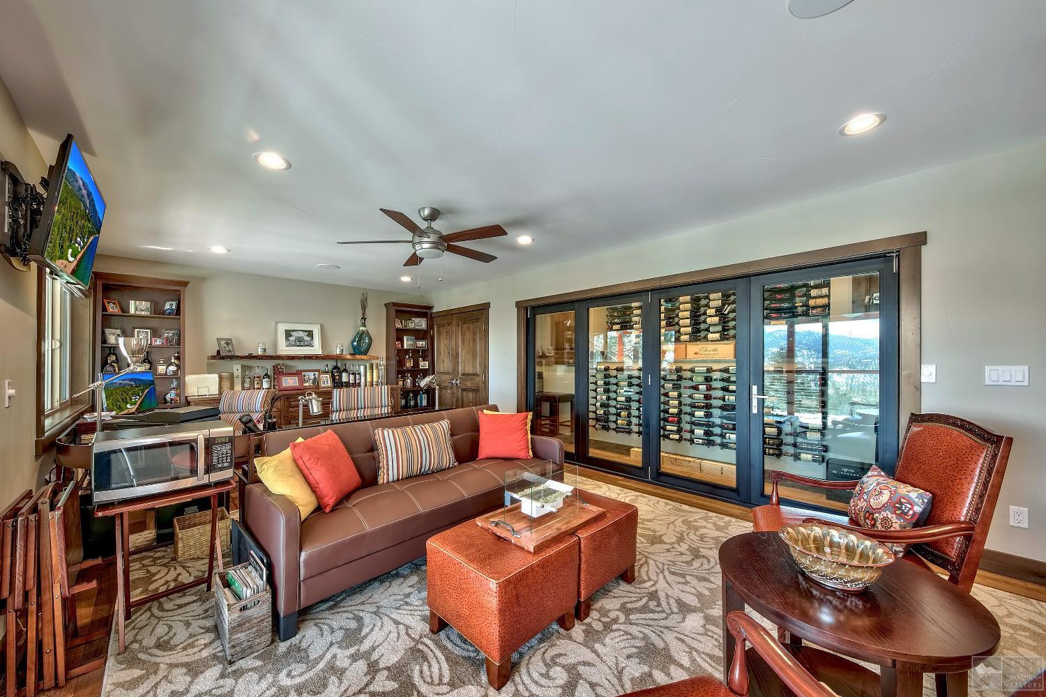 416 Maryanne Drive Stateline, NV 89449 - Photo 14 of 32 a living room with furniture and a floor to ceiling window