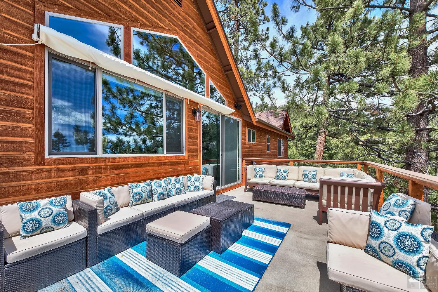 416 Maryanne Drive Stateline, NV 89449 - Photo 26 of 32 a balcony with furniture and a book shelf