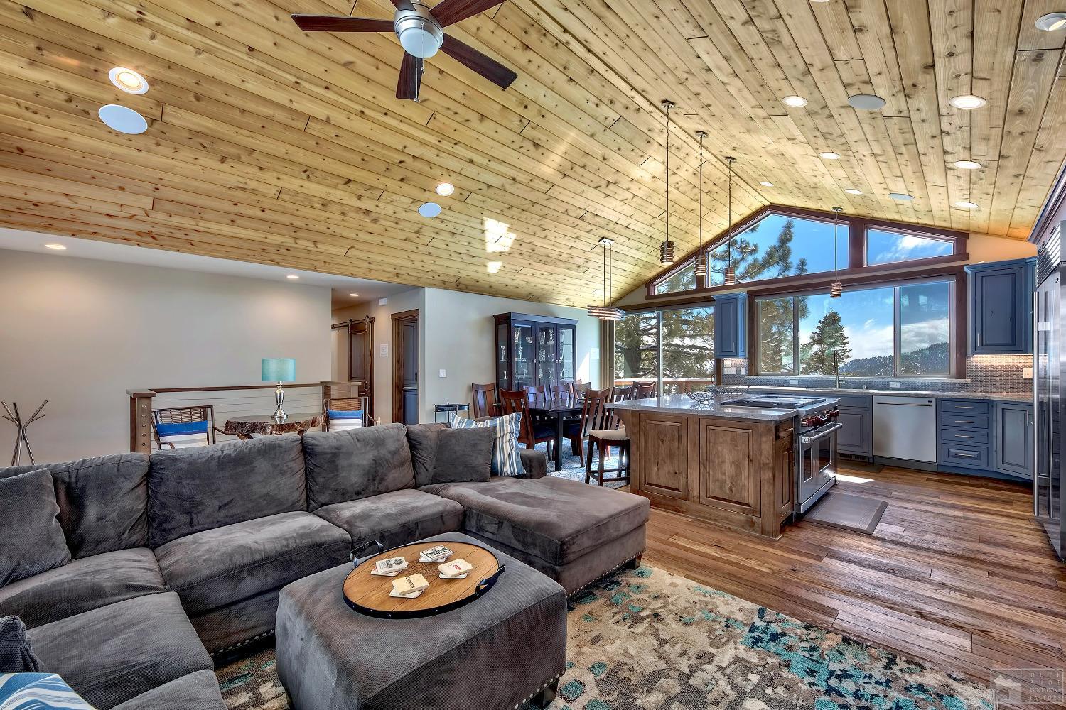 416 Maryanne Drive Stateline, NV 89449 - Photo 3 of 32 a living room with furniture a wooden floor and kitchen view