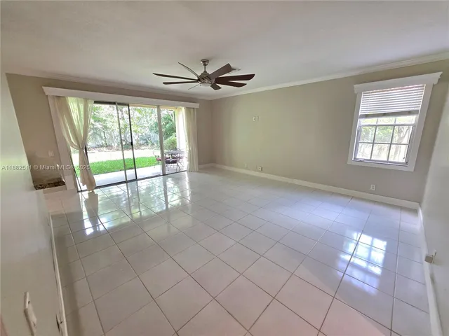 a view of an empty room and window