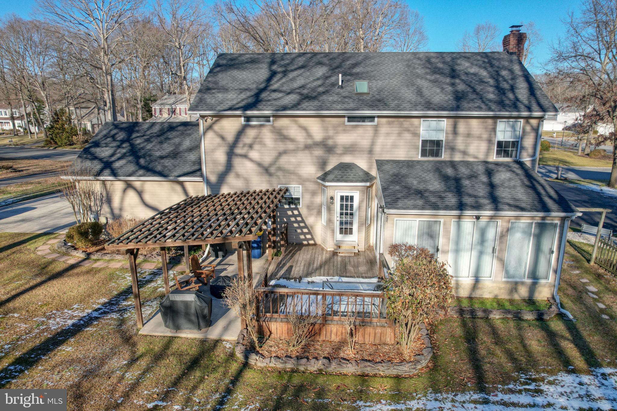 108 Burning Tree Road Dover, DE 19904 - Photo 11 of 70 a view of a patio with table and chairs and potted plants