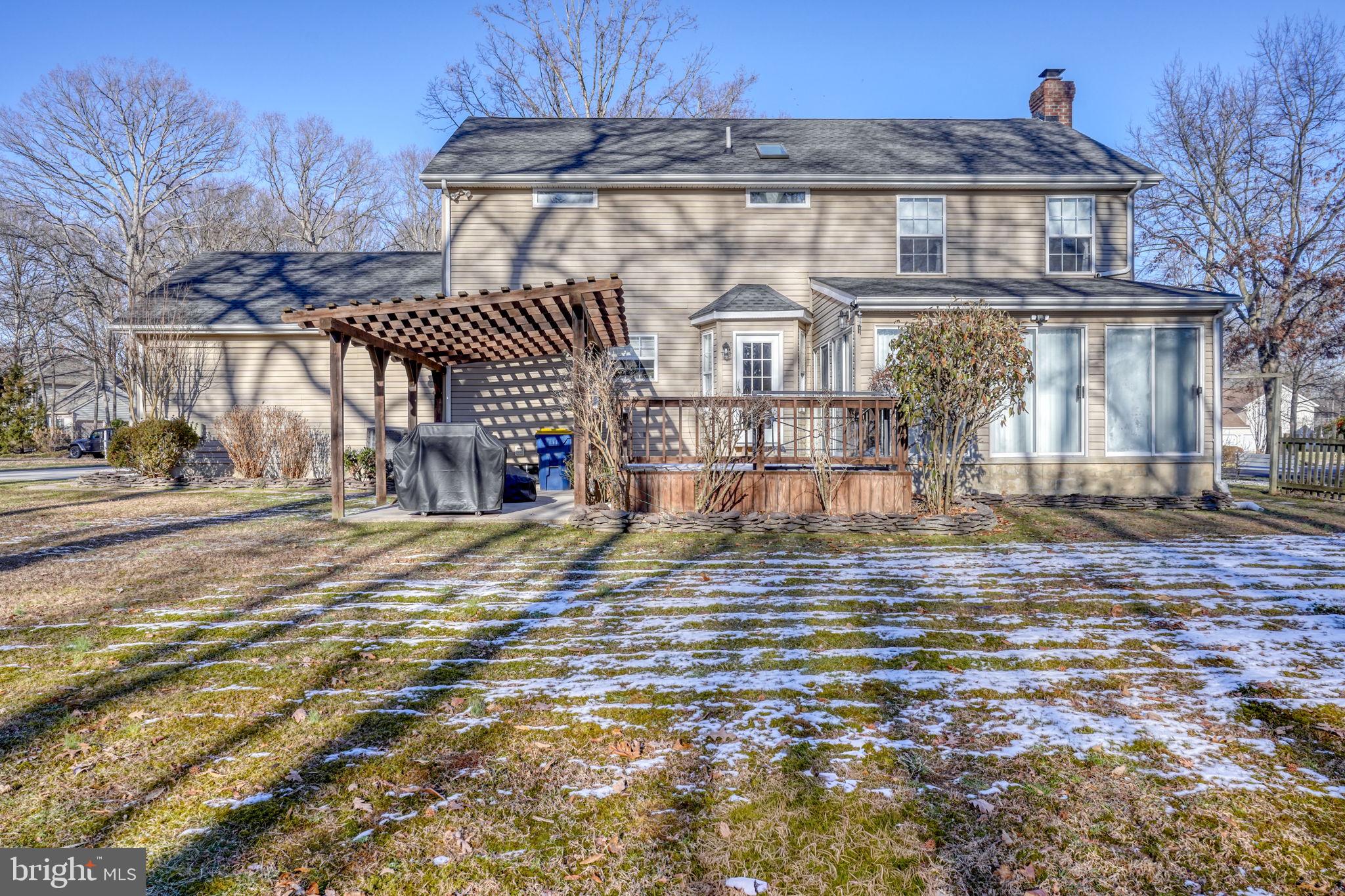 108 Burning Tree Road Dover, DE 19904 - Photo 12 of 70 a front view of a house with a yard