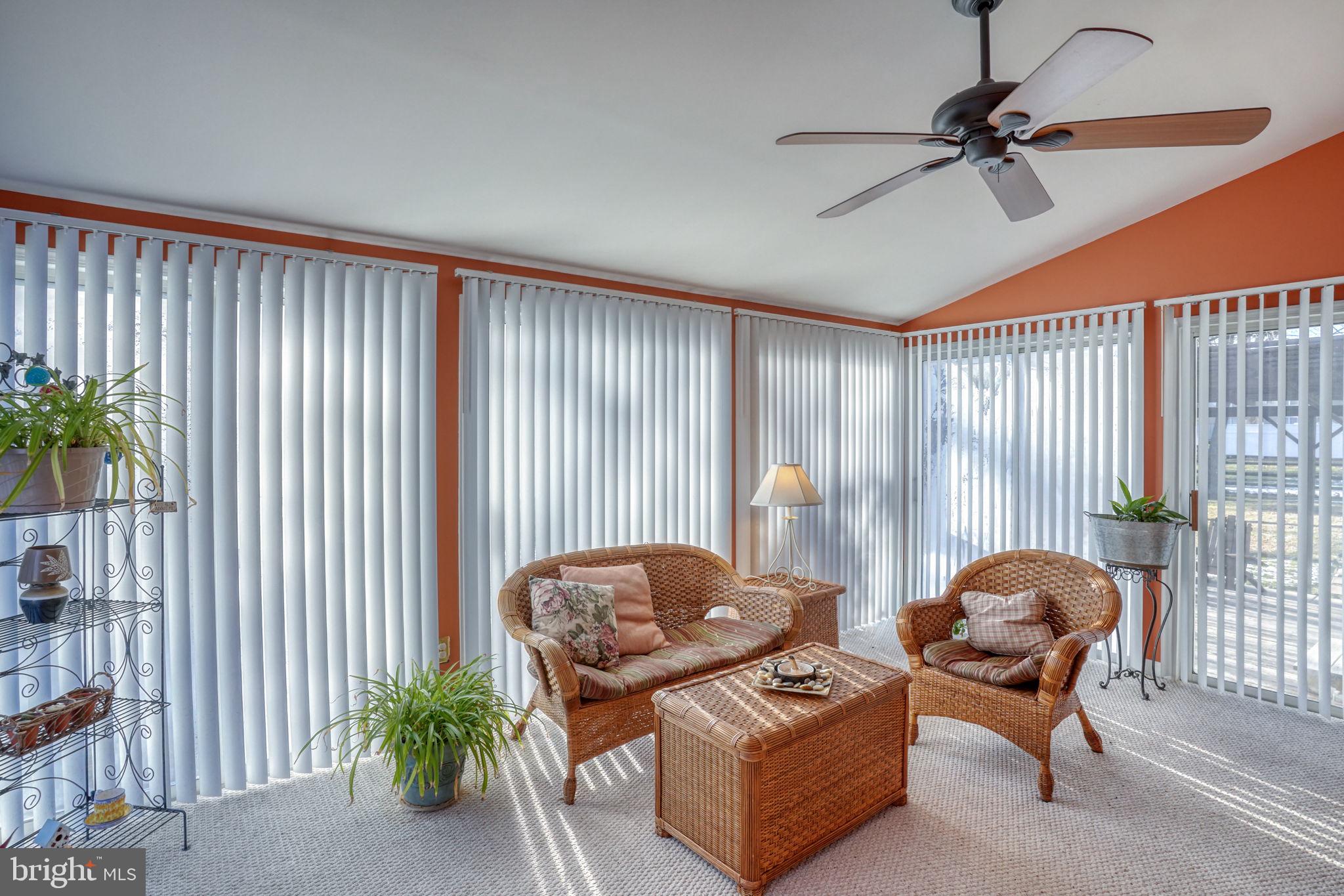 108 Burning Tree Road Dover, DE 19904 - Photo 28 of 70 a living room with furniture and a large window