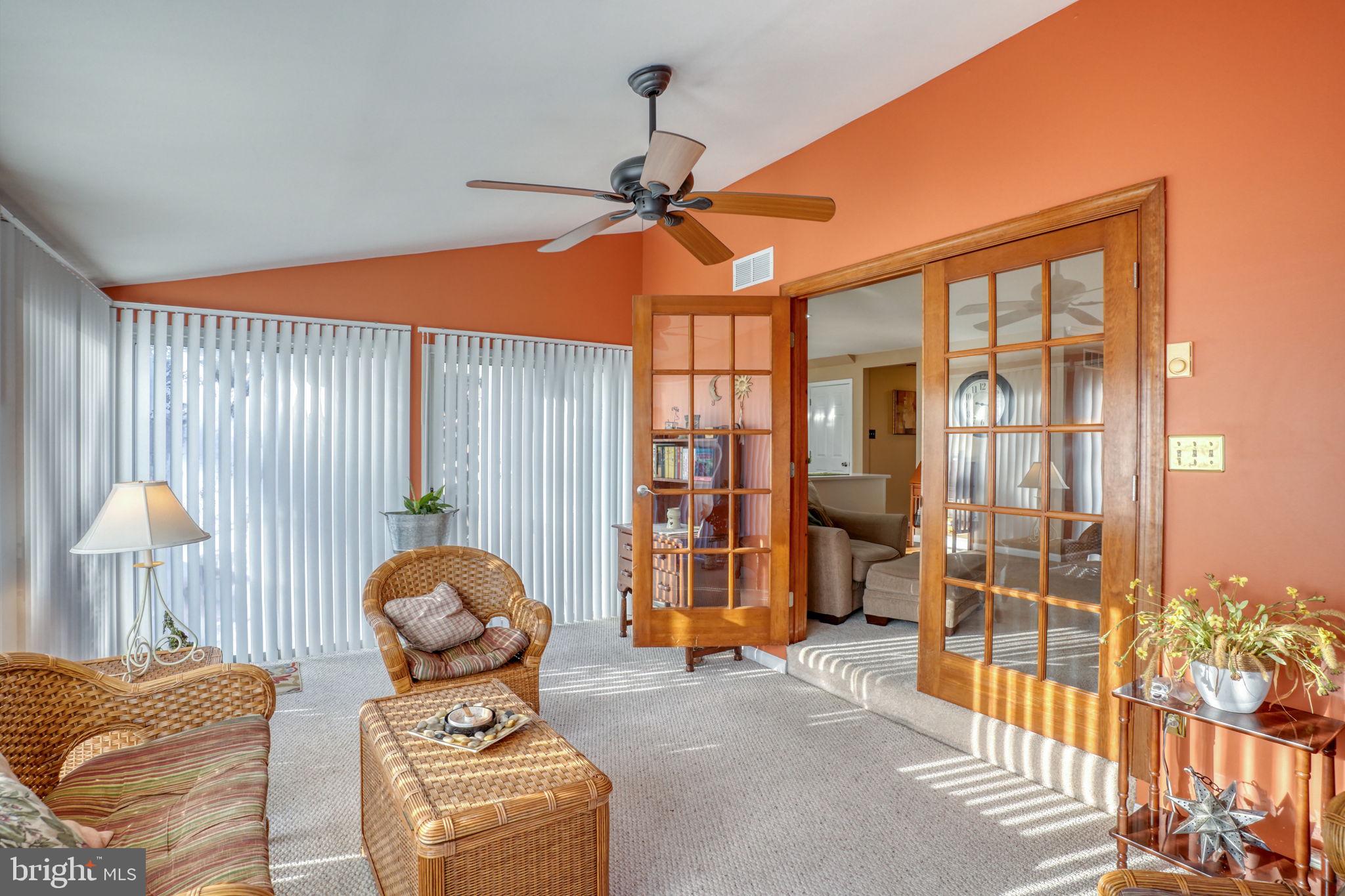 108 Burning Tree Road Dover, DE 19904 - Photo 29 of 70 a room with furniture and a chandelier