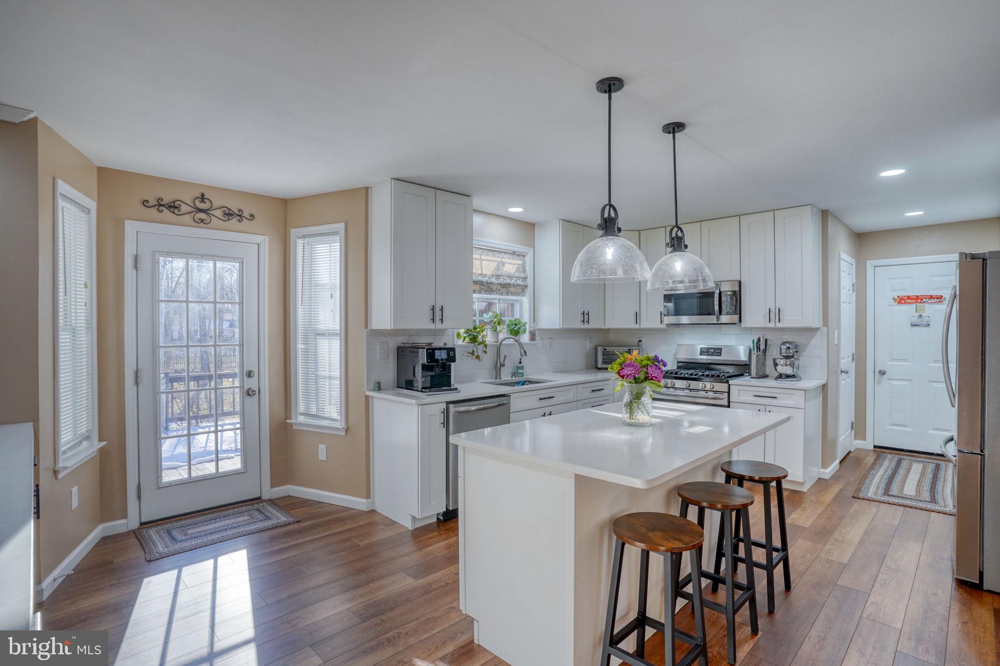 108 Burning Tree Road Dover, DE 19904 - Photo 32 of 70 Kitchen Door to the Deck