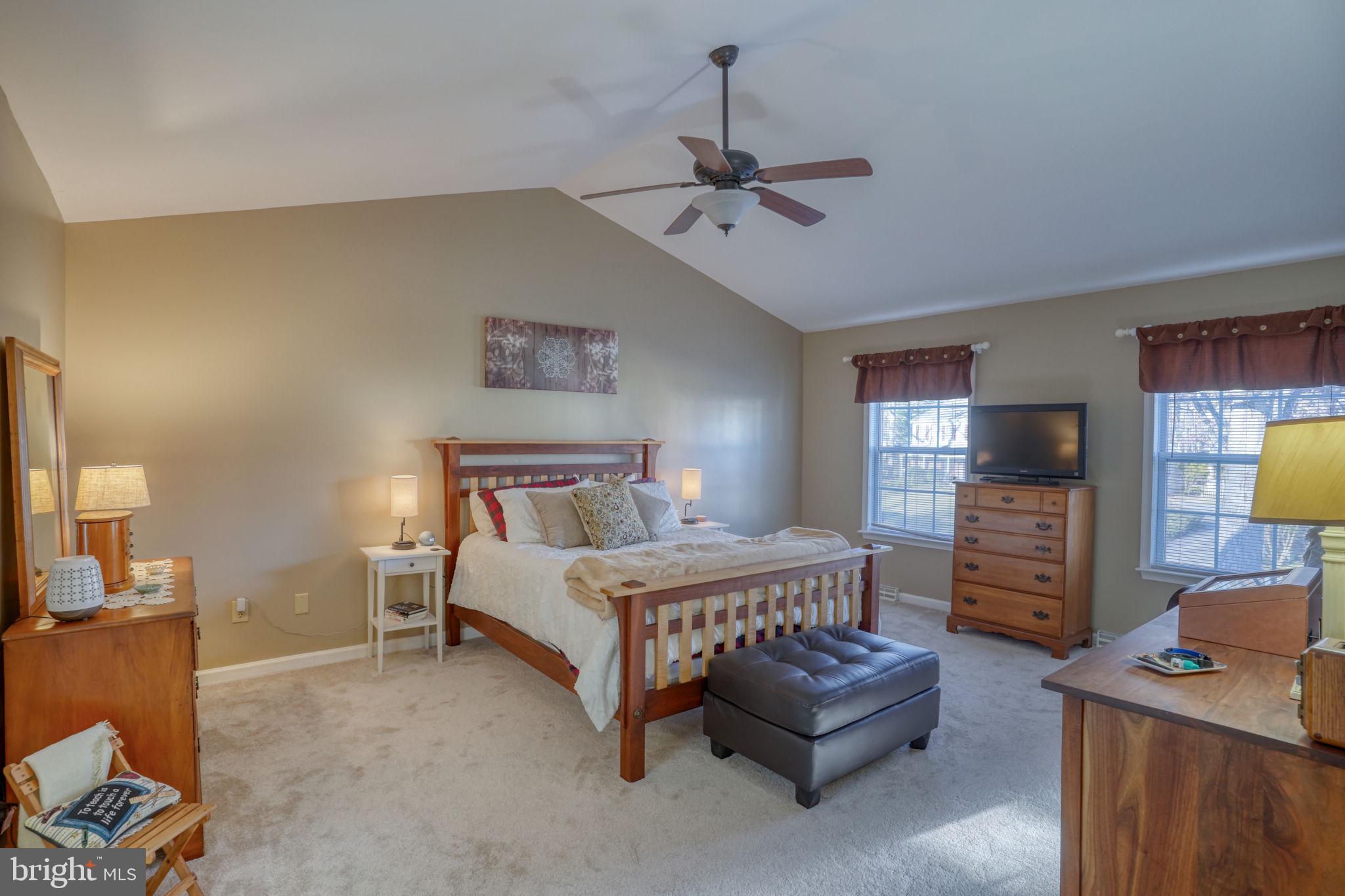 108 Burning Tree Road Dover, DE 19904 - Photo 42 of 70 a bedroom with a bed and furniture