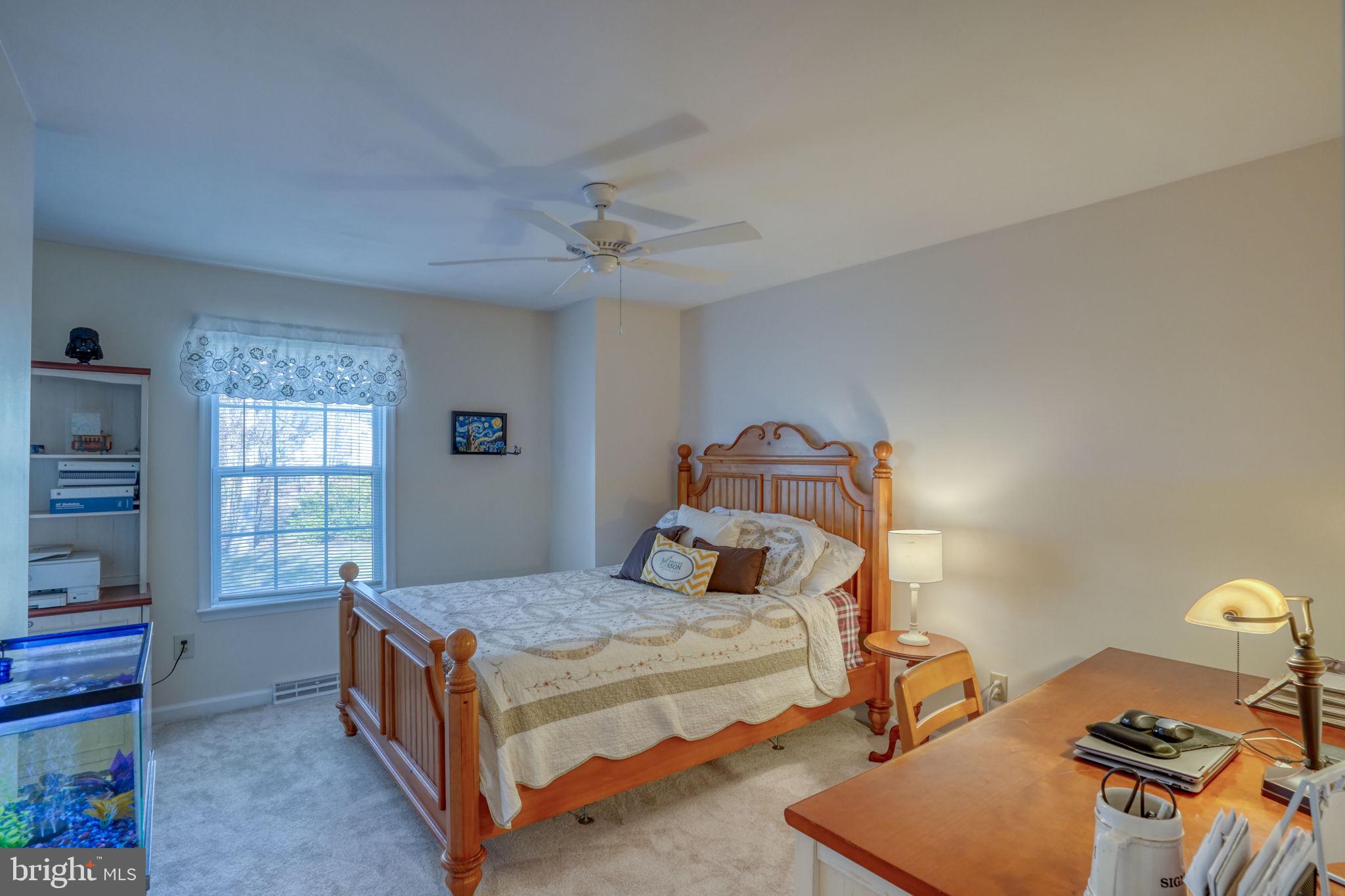 108 Burning Tree Road Dover, DE 19904 - Photo 47 of 70 a bedroom with a bed and a window