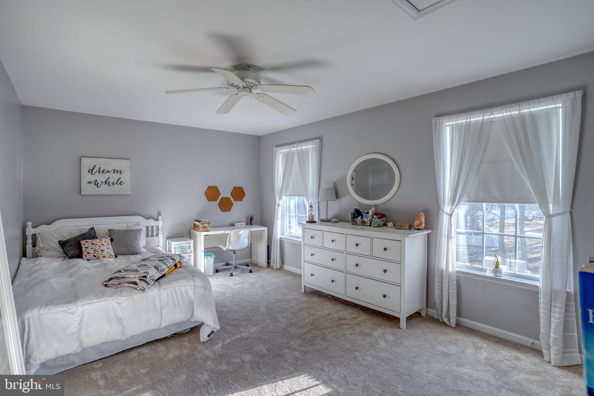 108 Burning Tree Road Dover, DE 19904 - Photo 50 of 70 a living room with furniture and a window