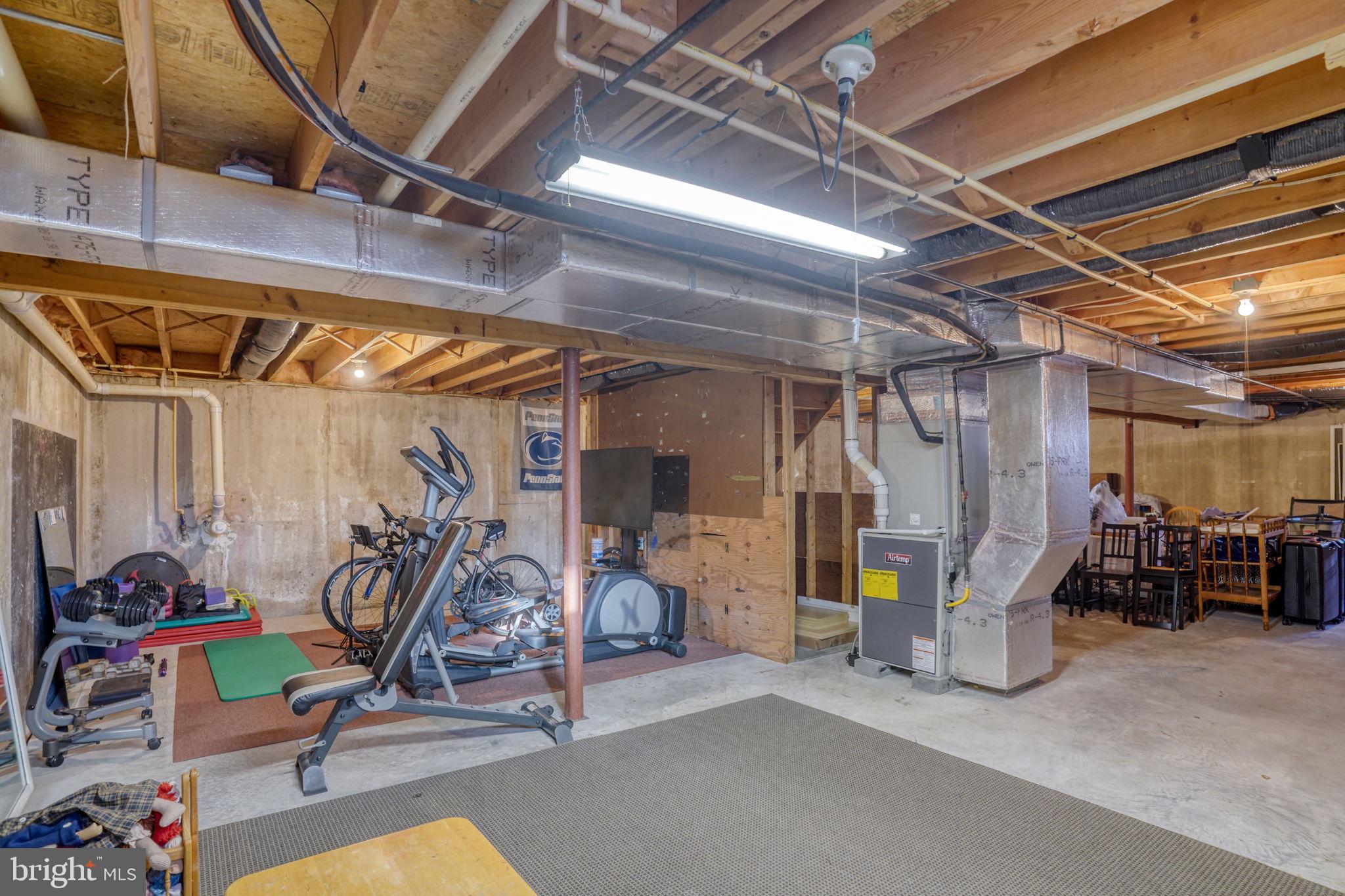 108 Burning Tree Road Dover, DE 19904 - Photo 58 of 70 a view of a room with gym equipment