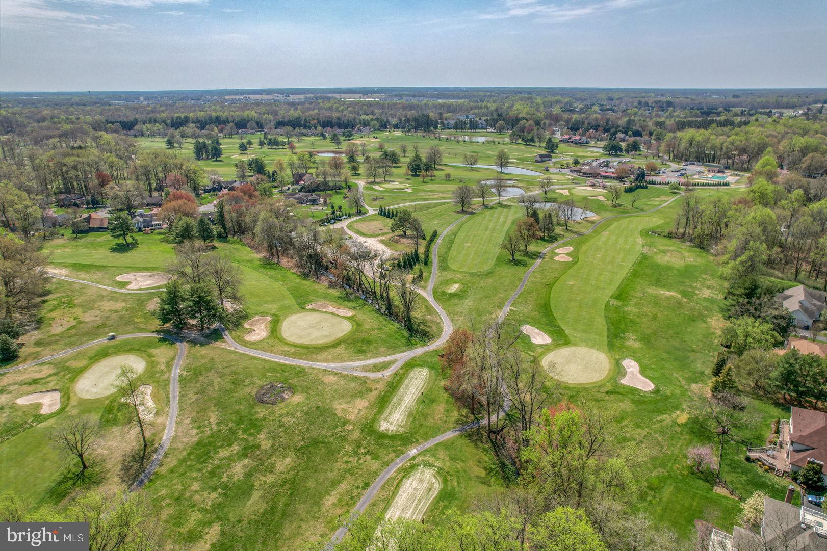 108 Burning Tree Road Dover, DE 19904 - Photo 62 of 70 a view of a lake with a city