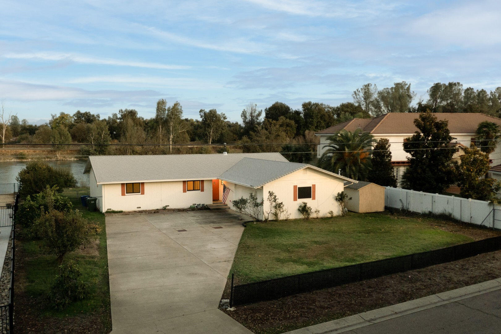 7035 Riverside Drive Redding, CA 96001 - Photo 2 of 23 a view of a house with a yard