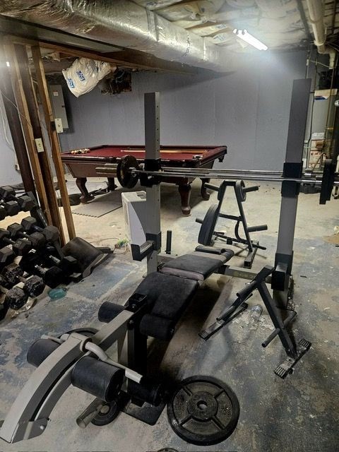 20 Farm Pond Road Dracut, MA 01826 - Photo 36 of 39 a view of a room with gym equipment