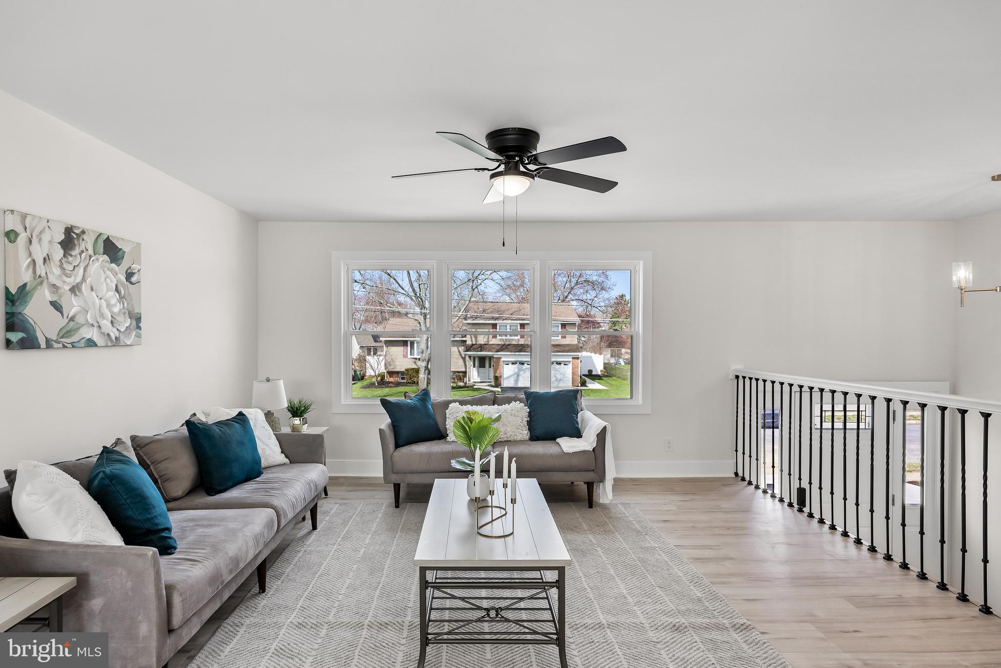10 Cobblestone Road Cherry Hill, NJ 08003 - Photo 4 of 15 a living room with furniture and a large window