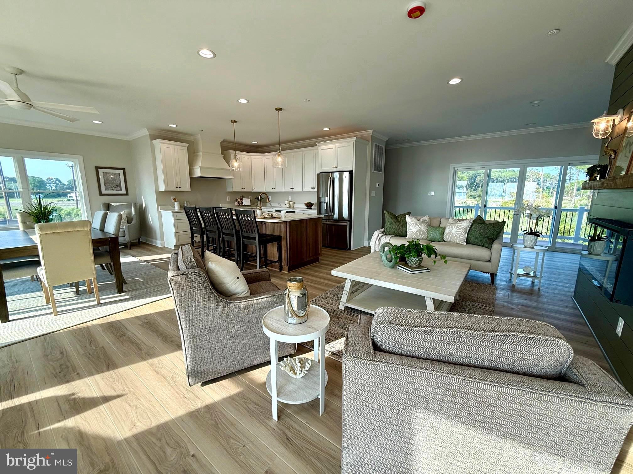 16394 Thomas Road Piney Point, MD 20674 - Photo 15 of 53 a living room with furniture and a view of kitchen