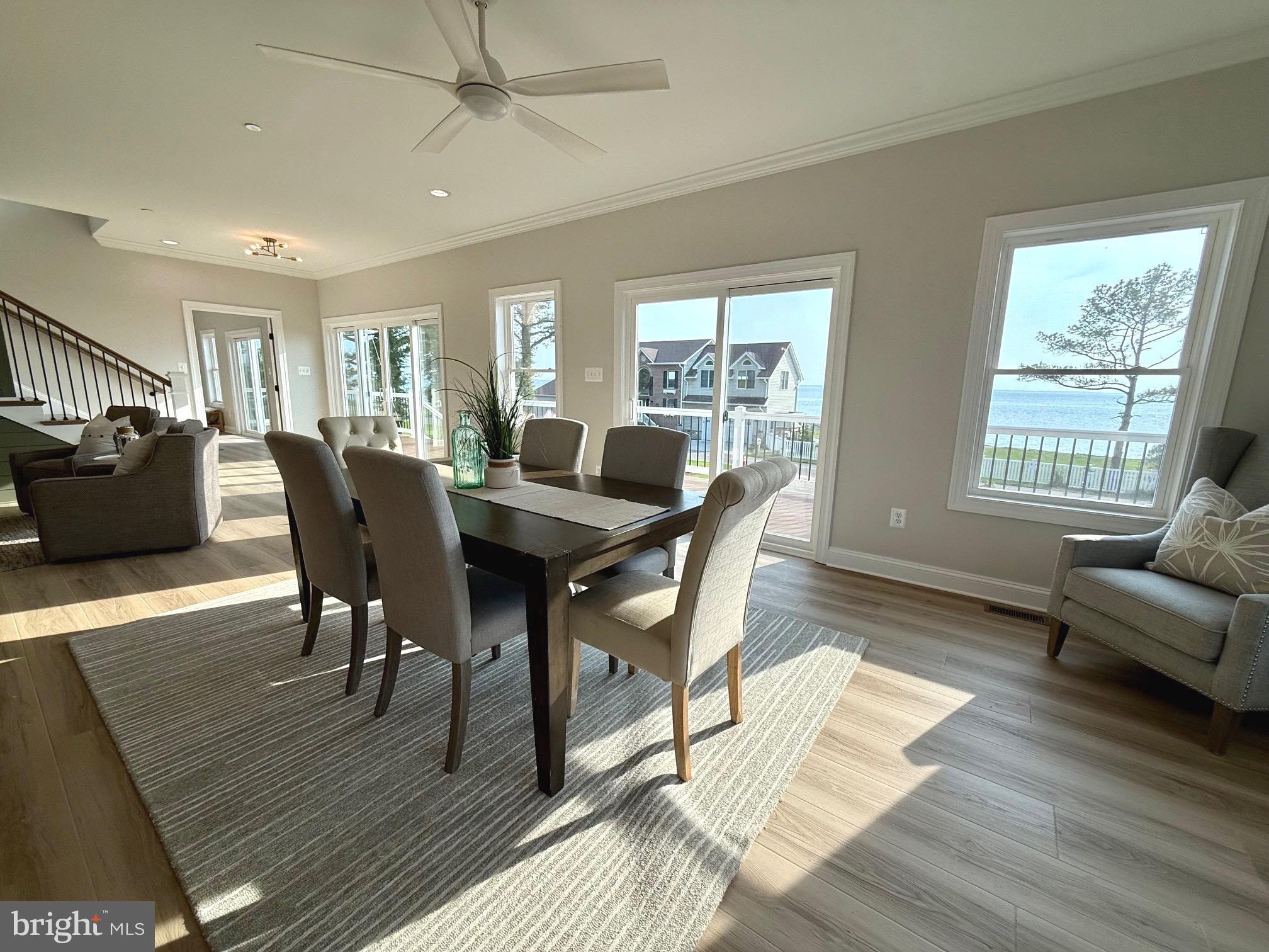 16394 Thomas Road Piney Point, MD 20674 - Photo 19 of 53 a view of a dining room with furniture window and wooden floor