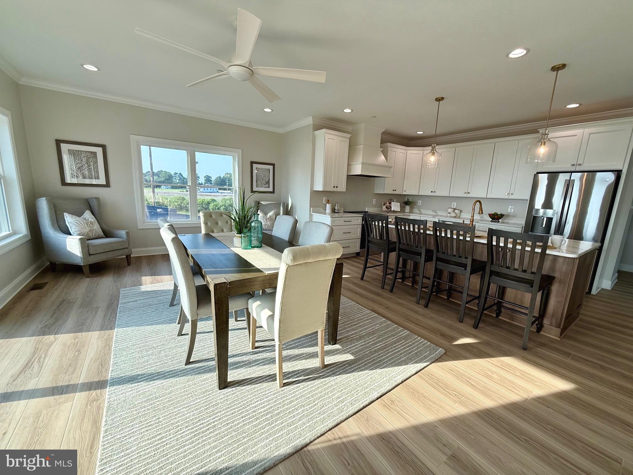 16394 Thomas Road Piney Point, MD 20674 - Photo 22 of 53 a view of a dining room with furniture window and wooden floor