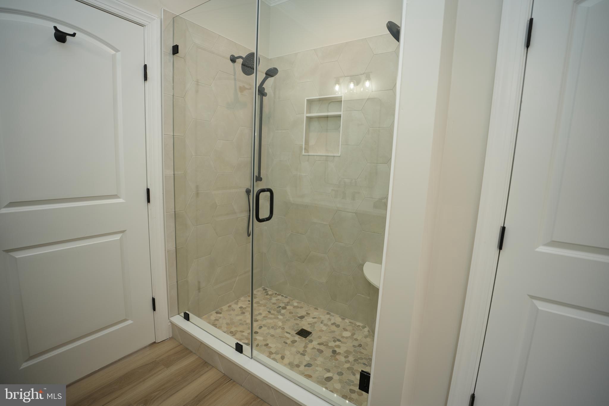 16394 Thomas Road Piney Point, MD 20674 - Photo 33 of 53 a bathroom with a shower