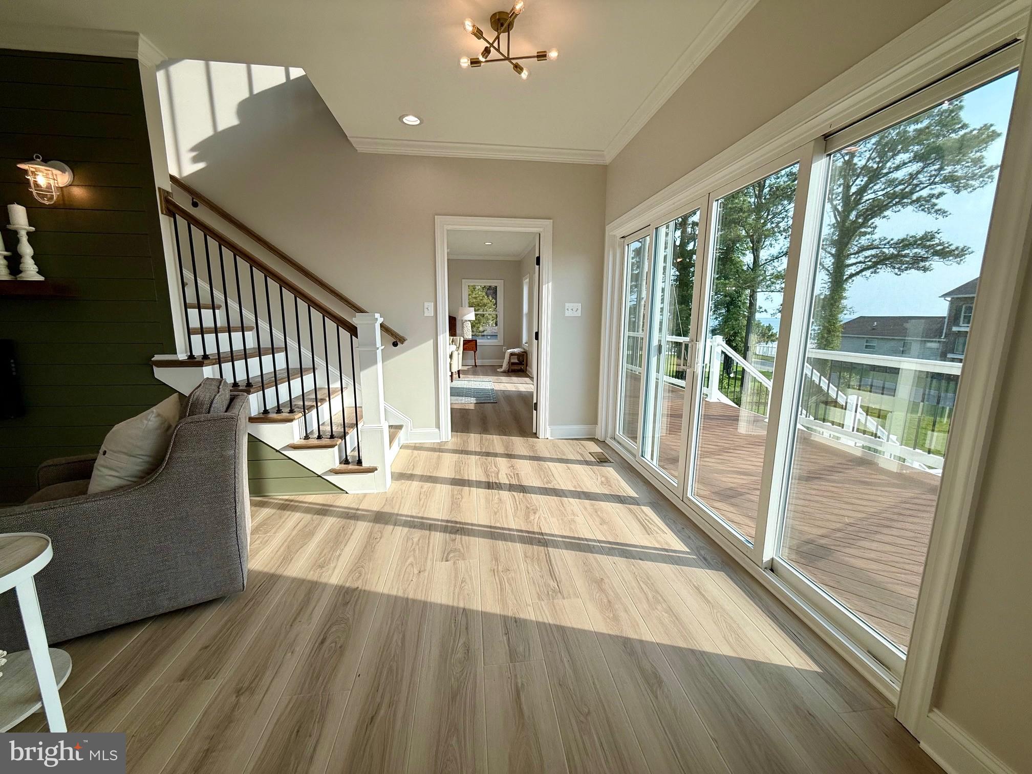 16394 Thomas Road Piney Point, MD 20674 - Photo 34 of 53 a view of a living room and a balcony
