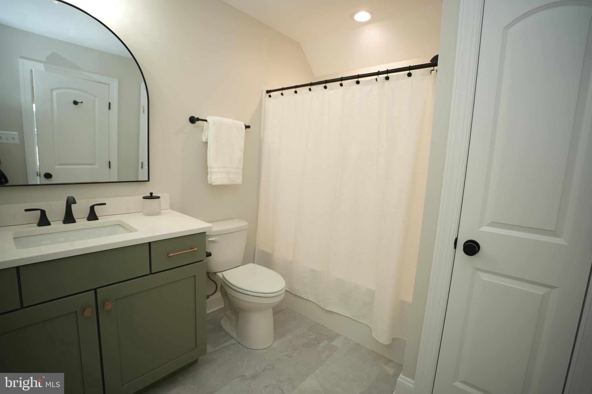 16394 Thomas Road Piney Point, MD 20674 - Photo 40 of 53 a bathroom with a sink toilet and shower