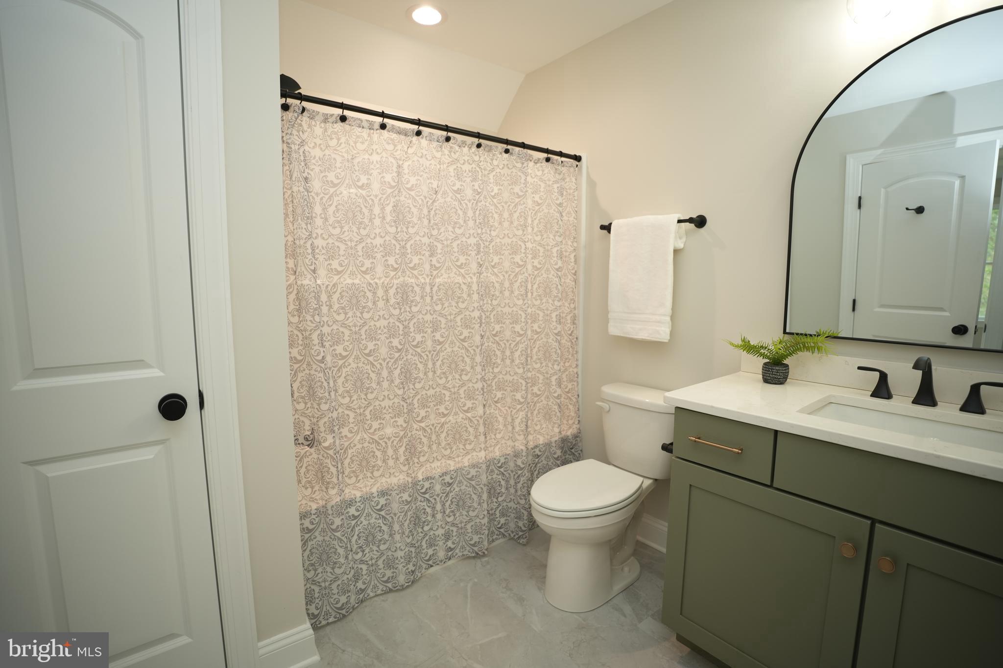 16394 Thomas Road Piney Point, MD 20674 - Photo 43 of 53 a bathroom with a sink a toilet and shower