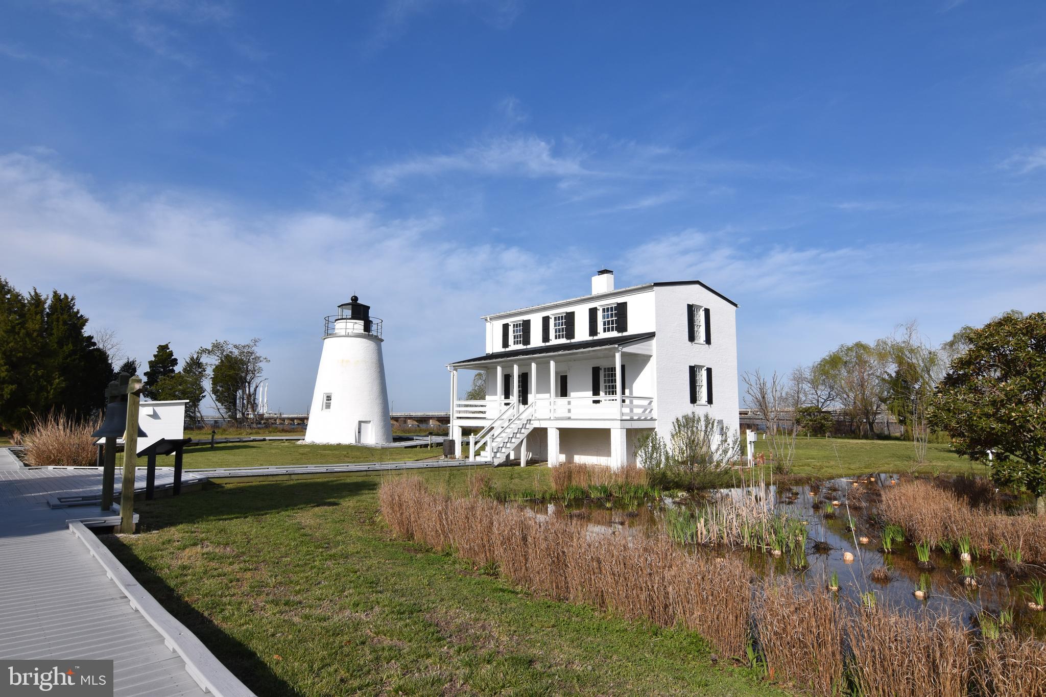 16394 Thomas Road Piney Point, MD 20674 - Photo 46 of 53 a view of a house with a yard