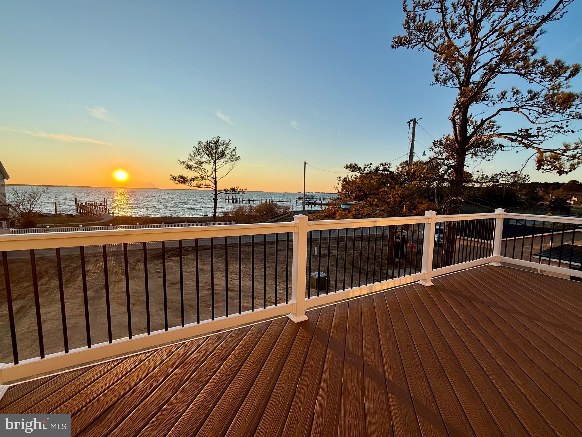 16394 Thomas Road Piney Point, MD 20674 - Photo 6 of 53 a view of balcony with wooden floor and fence