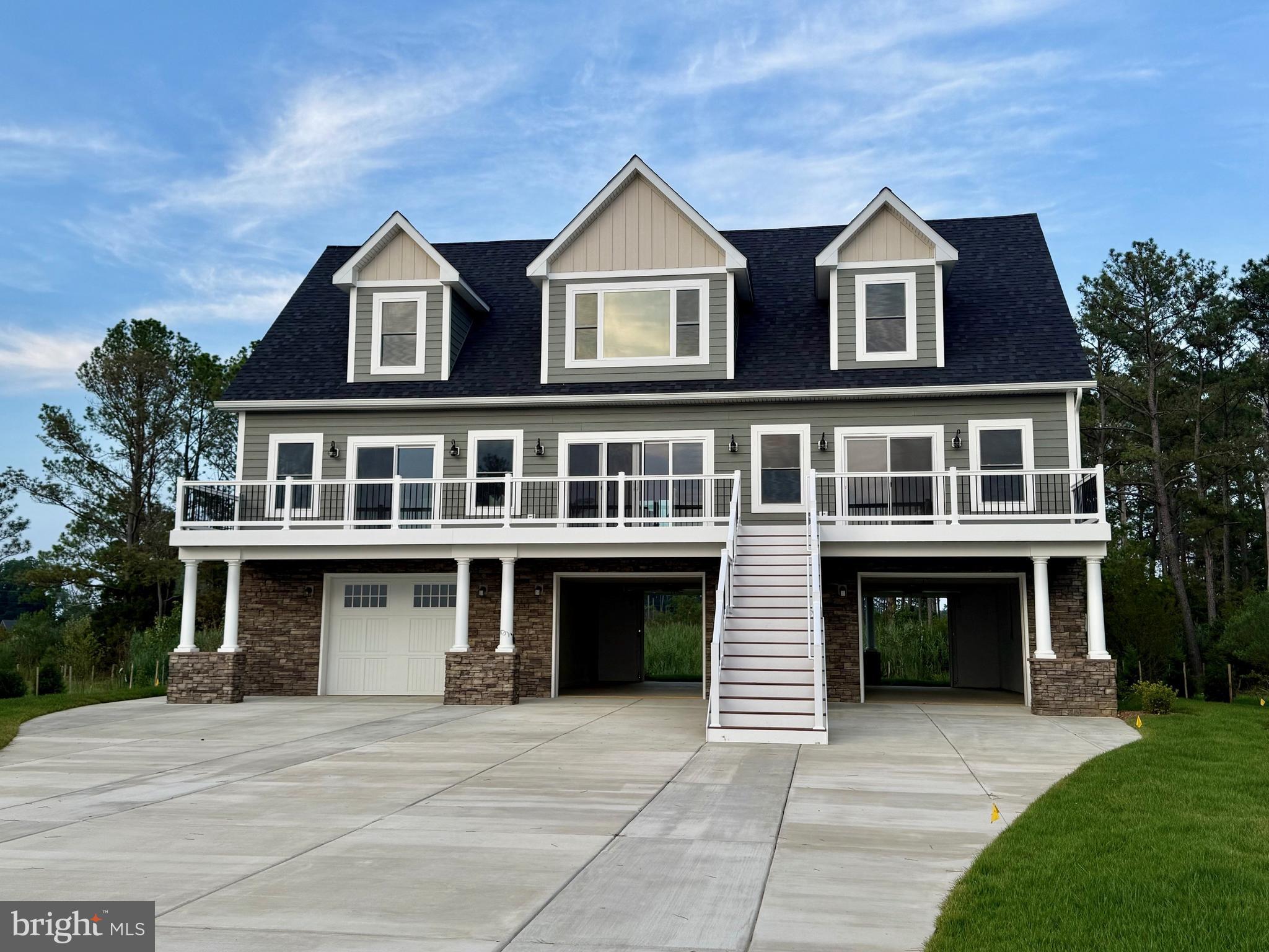 16394 Thomas Road Piney Point, MD 20674 - Photo 7 of 53 a front view of a house with yard and parking