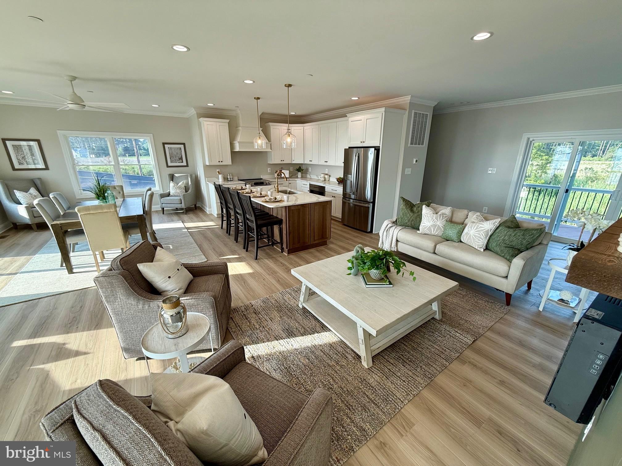 16394 Thomas Road Piney Point, MD 20674 - Photo 8 of 53 a living room with furniture kitchen and a large window