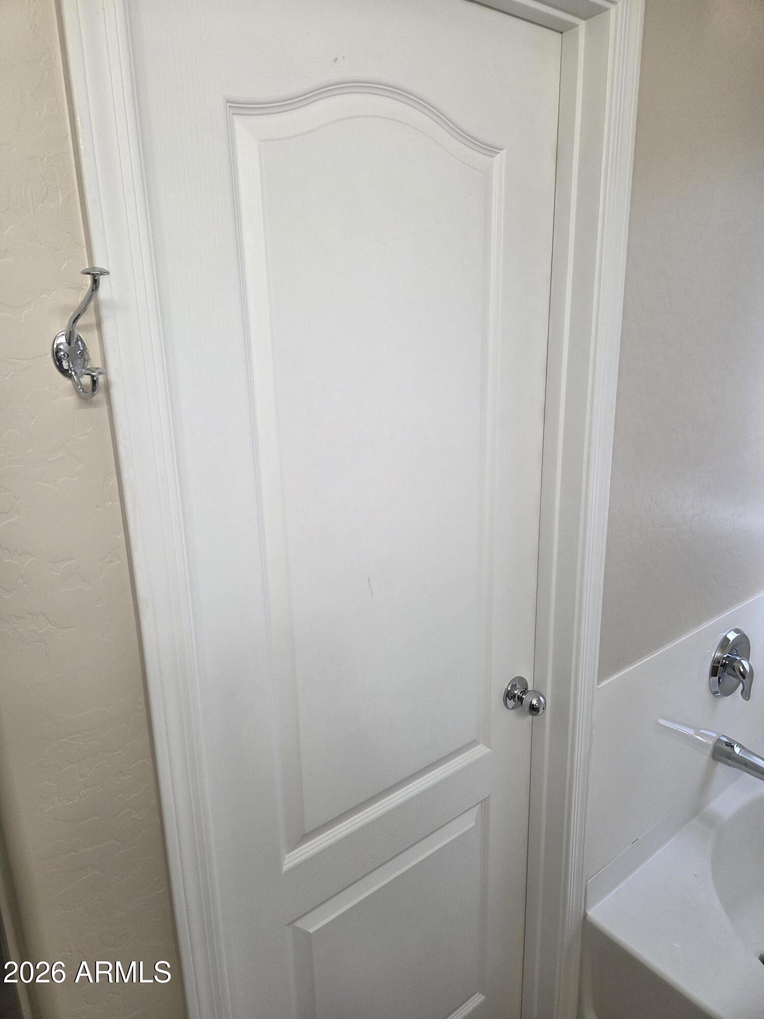 14195 West Hearn Road Surprise, AZ 85379 - Photo 22 of 23 a bathroom with a sink a toilet and shower