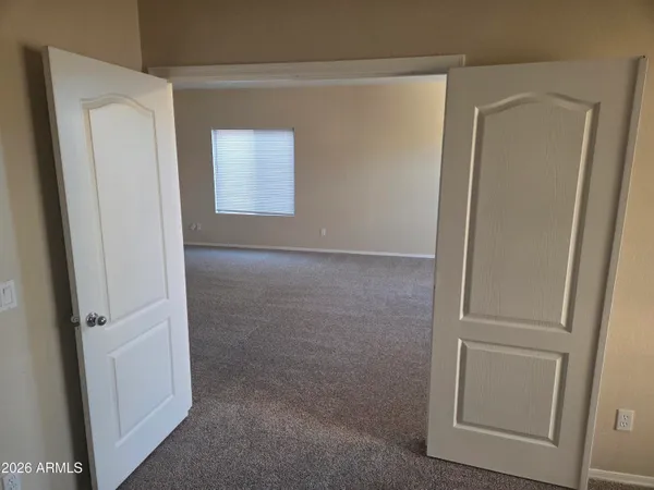 an empty room with windows