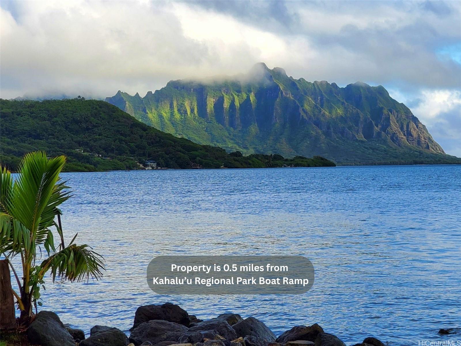 47-285 Waihee Road, Unit D Kaneohe, HI 96744 - Photo 23 of 25 a view of a street with a building in the background
