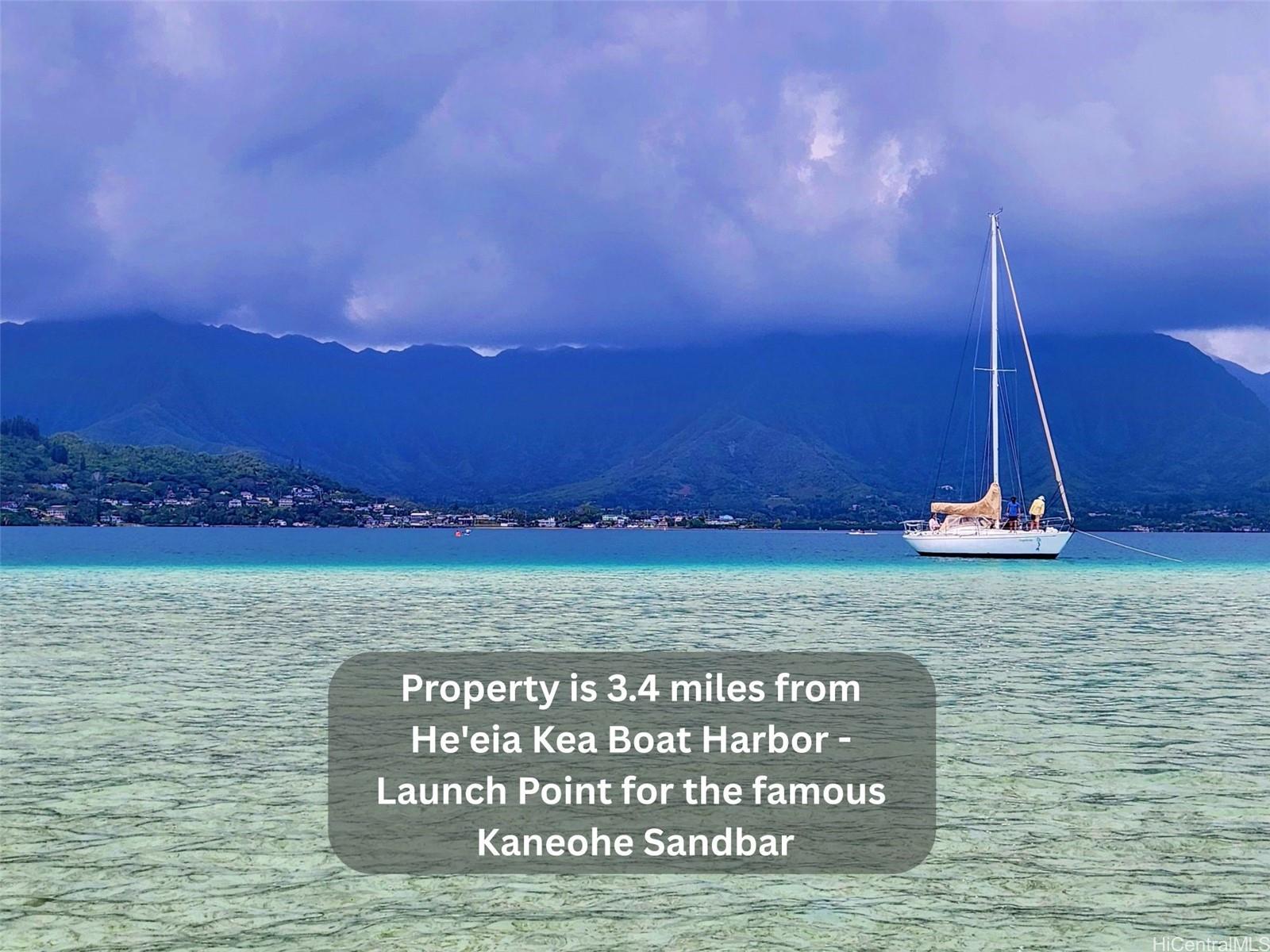 47-285 Waihee Road, Unit D Kaneohe, HI 96744 - Photo 24 of 25 a view of water with sunset