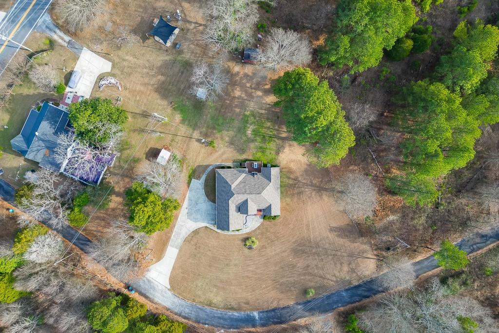 1262 Bowman Road Lawrenceville, GA 30045 - Photo 32 of 32 an aerial view of a house with outdoor space
