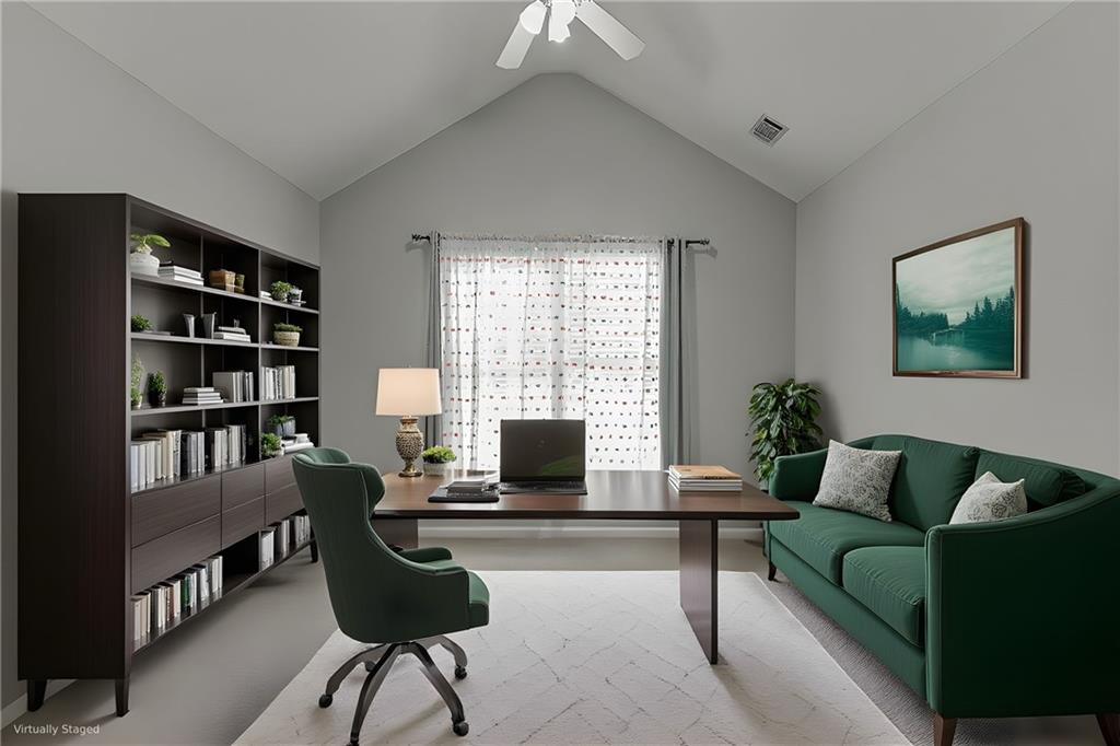 1262 Bowman Road Lawrenceville, GA 30045 - Photo 9 of 32 a living room with furniture potted plant and a window