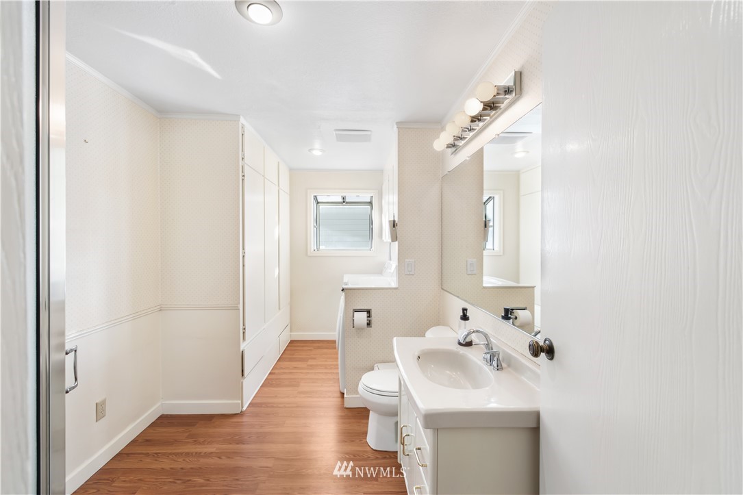 2012 Jones Circle Southeast Renton, WA 98055 - Photo 14 of 25 a bathroom with a sink a toilet and shower