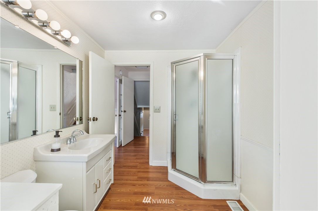 2012 Jones Circle Southeast Renton, WA 98055 - Photo 15 of 25 a bathroom with a double vanity sink and mirror