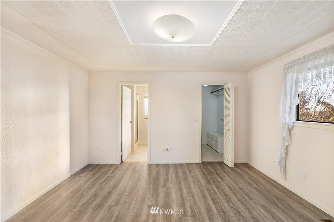2012 Jones Circle Southeast Renton, WA 98055 - Photo 24 of 25 wooden floor in an empty room with a window