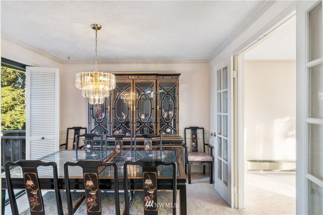 2012 Jones Circle Southeast Renton, WA 98055 - Photo 8 of 25 a view of a dining room with furniture and window