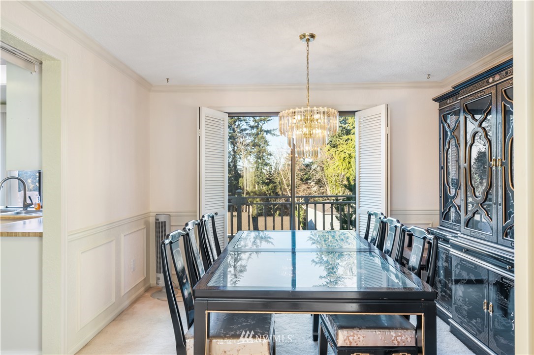 2012 Jones Circle Southeast Renton, WA 98055 - Photo 9 of 25 a view of a dining room with furniture window and outside view