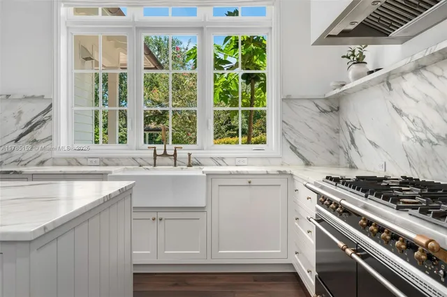 a view of a hallway with seating area