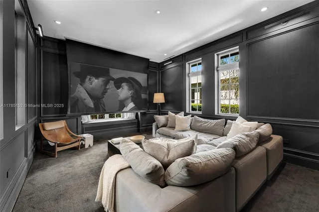 a spacious bedroom with a large bed and large window