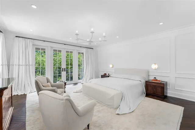 a bathroom with a granite countertop sink toilet a mirror and shower