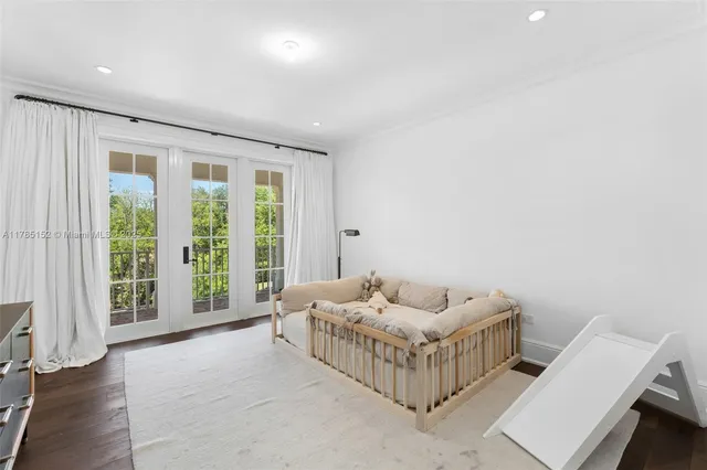 a front view of a house with a yard table and chairs