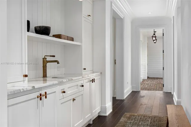 a front view of a house with a yard table and chairs