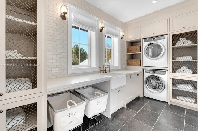 a front view of a house with swimming pool having outdoor seating